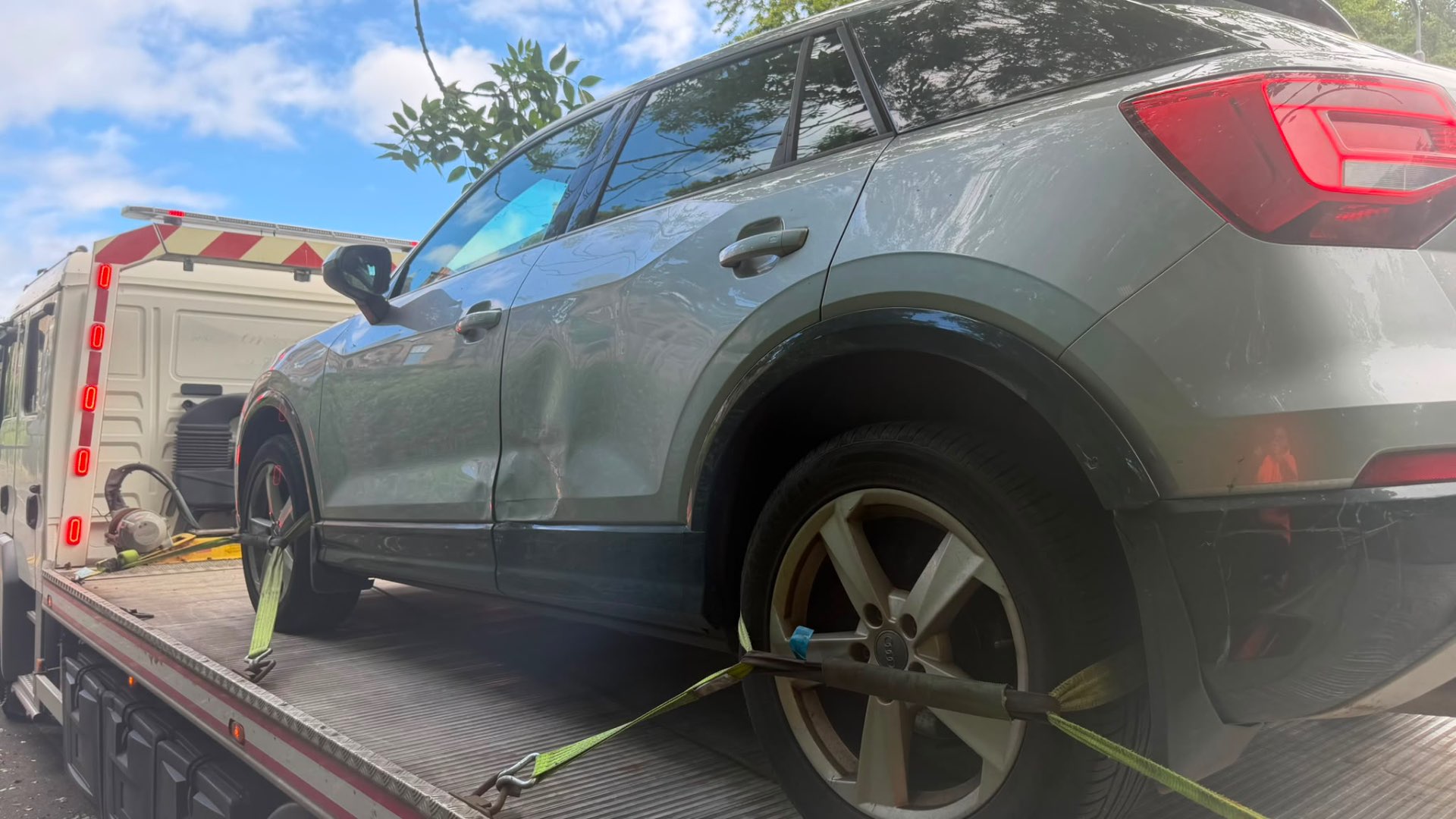 Grey Audi Q2 secured on MZL recovery flatbed